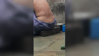 Desi Girl Bathing In Open Courtyard Wearing Red Tights