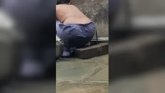 Desi Girl Bathing In Open Courtyard Wearing Red Tights