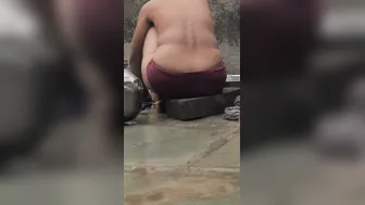 Desi Girl Bathing In Open Courtyard Wearing Red Tights