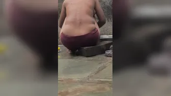 Desi Girl Bathing In Open Courtyard Wearing Red Tights