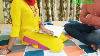 Indian Tutor Teaching Young Students About Sex Education At Home