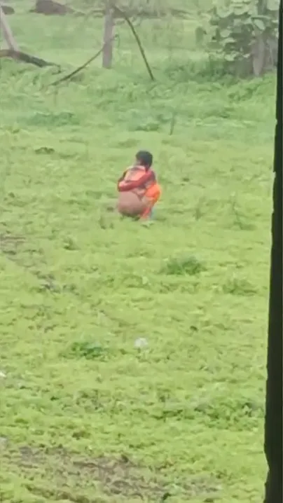 Desi Aunty's Morning Ritual in the Open Field